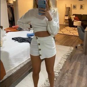 small white skort with buttons